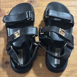 Steve Madden Black Sandals with Gold Accents